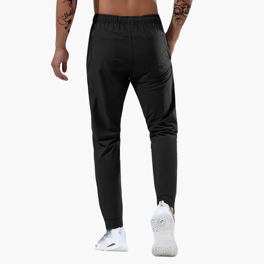 Xavier | Pantalón Deportivo Hombre Running Bolsillos Cremallera