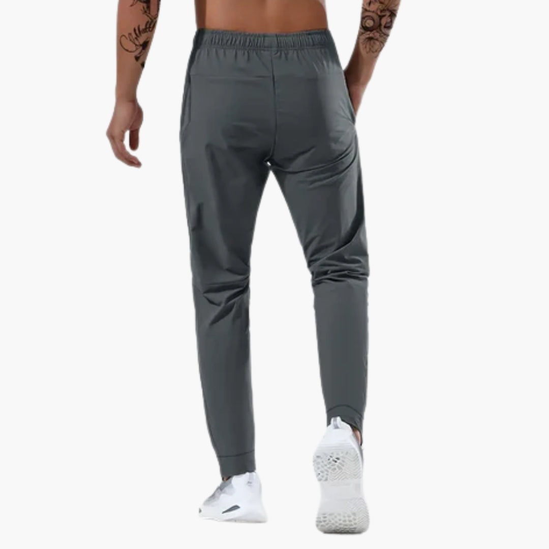 Xavier | Pantalón Deportivo Hombre Running Bolsillos Cremallera